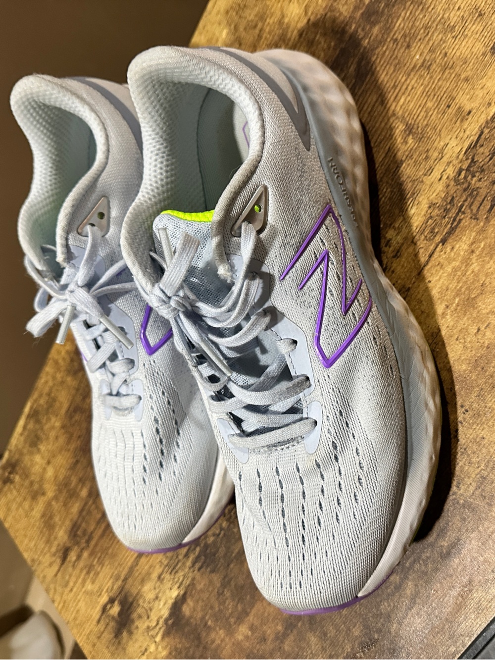 New Balance Light blue Running Shoes with Purple Accents